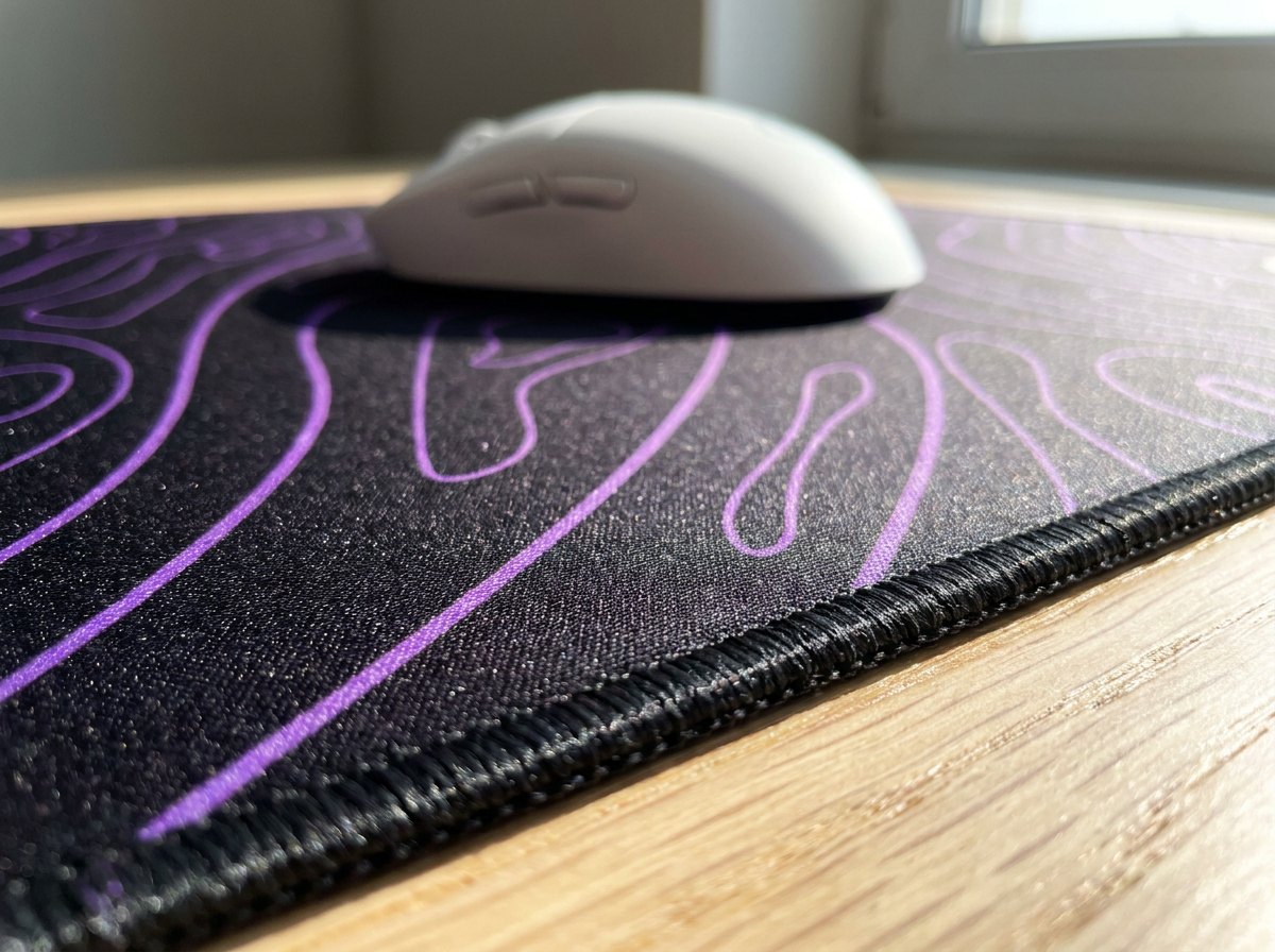 Close-up of the stitched edge and woven surface of an Alt Customs mat